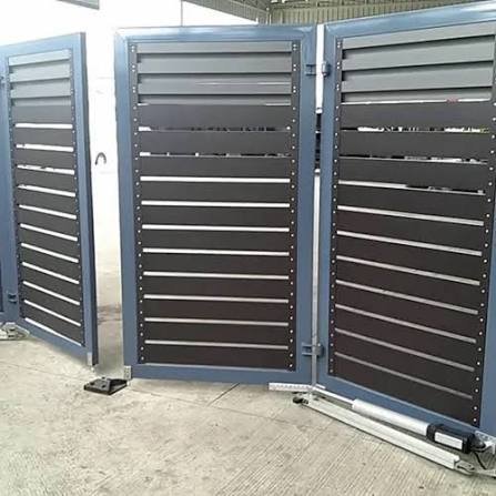 Enamel painting on a modern metal folding gate